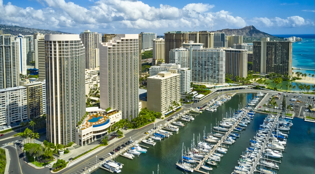 Bird's eye view of Prince Waikiki, the yacht harbor and Diamond Head.