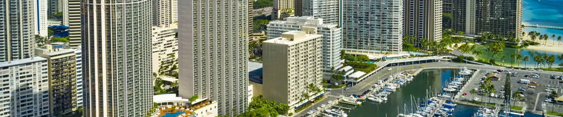 Bird's eye view of Prince Waikiki, the yacht harbor and Diamond Head.