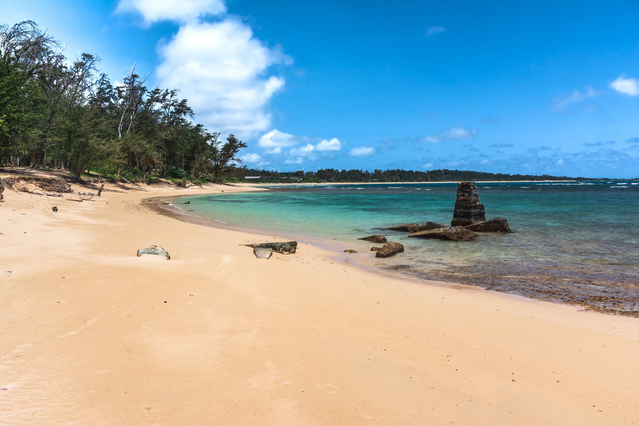 Sand beach along Malaekahana State Area in Oahu, Hawaii